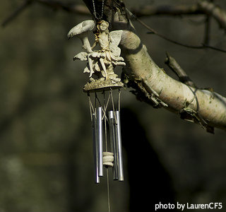 Resin Angel windchime hung on tree branch with stainless steel tubes for bells, resin Angel windchimes, decorative small windchimes.