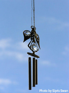 Angel windchimes with halo over Angels head and crystal glass decorations with blue sky and clouds, spiritual windchimes, metal windchimes.