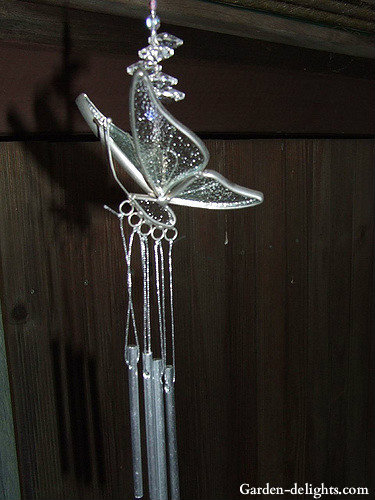  Butterfly glass wings windchimes with decorative metal outline with aluminum windchime tubes hanging from strings, iron butterfly windchimes, wind chime happiness, wind music, whimsical windchimes, butterflies, wind chime ideas, butterfly garden.