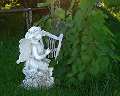  Fairy statue on ground with harp wind chimes,Fairy wind chimes, fantasy wind chimes..