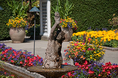 Garden water fountains, garden water features,Garden statue with flowers.