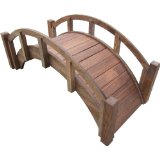 Dark stained Japanese high arched bridge providing a rustic look for the garden, Japanese garden bridges, backyard wooden bridges.