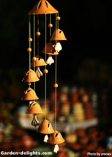 Orange bell top spiral ceramic windchimes with small decorative beads, painted ceramic wind chimes, Japanese spiral wind chimes,Clay windchimes, ceramic windchimes, wind chime bells, Clay bells, bells spiral, chimes Clay, spiral bells.