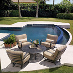 Patio furniture with four chairs and table beside pool, patio furniture, patio accessories.